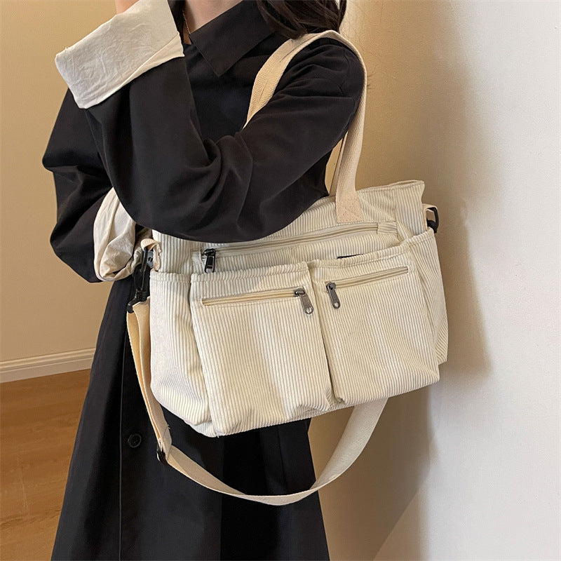 ANFINITE Taske™ - Ribfløjl med Rummeligt Design