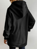 Sudadera larga de mujer con capucha y cremallera – corte oversize y bolsillos laterales