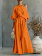 Ensemble femme en lin avec blouse drapée et pantalon large