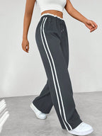 Pantaloni Jogger Donna a Gamba Ampia con Bande Laterali