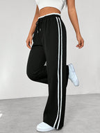 Pantaloni Jogger Donna a Gamba Ampia con Bande Laterali