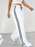 Pantaloni Jogger Donna a Gamba Ampia con Bande Laterali
