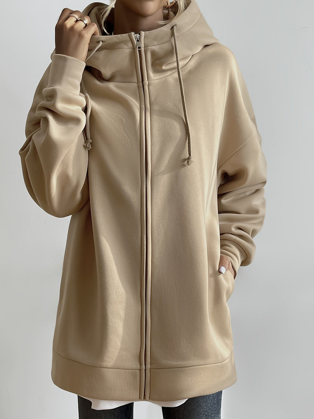 Sudadera larga de mujer con capucha y cremallera – corte oversize y bolsillos laterales
