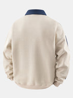 Polo de felpa para hombre con cremallera y textura de nido de abeja – corte cómodo y mangas a rayas