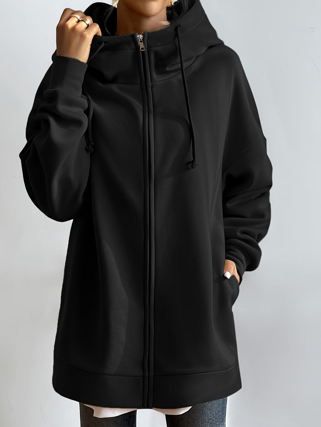 Sudadera larga de mujer con capucha y cremallera – corte oversize y bolsillos laterales