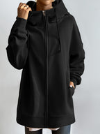 Sudadera larga de mujer con capucha y cremallera – corte oversize y bolsillos laterales