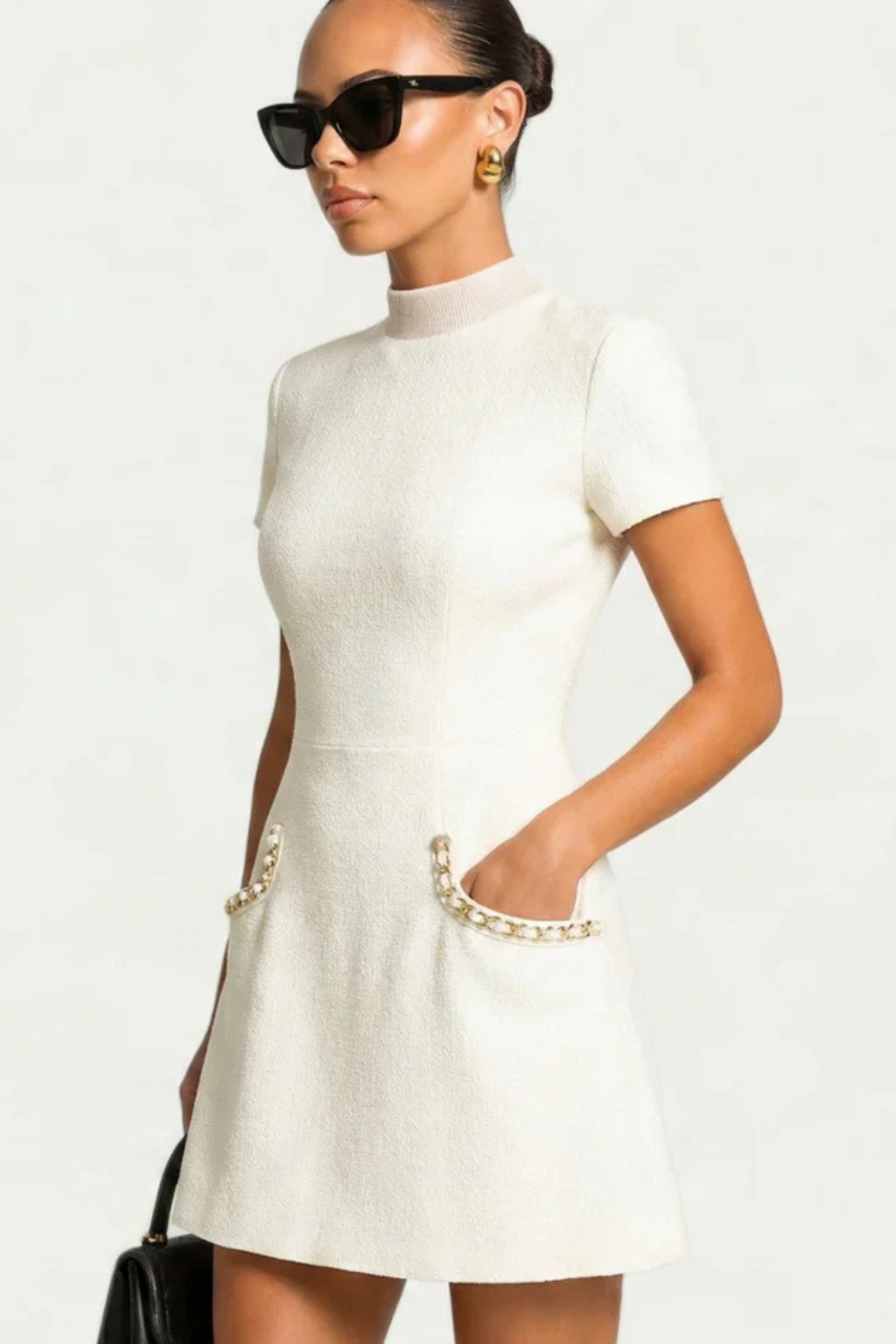 Minidress con Dettagli di Perle e Silhouette Elegante