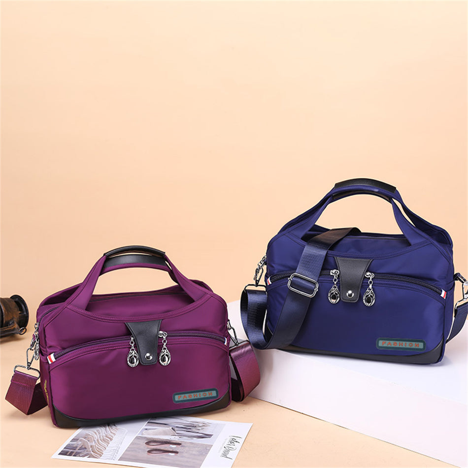 ANFINITE Anti-Tyveri Crossbody Taske med Stor Kapacitet