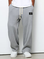Pantalones de hombre de corte relajado con cintura ajustable