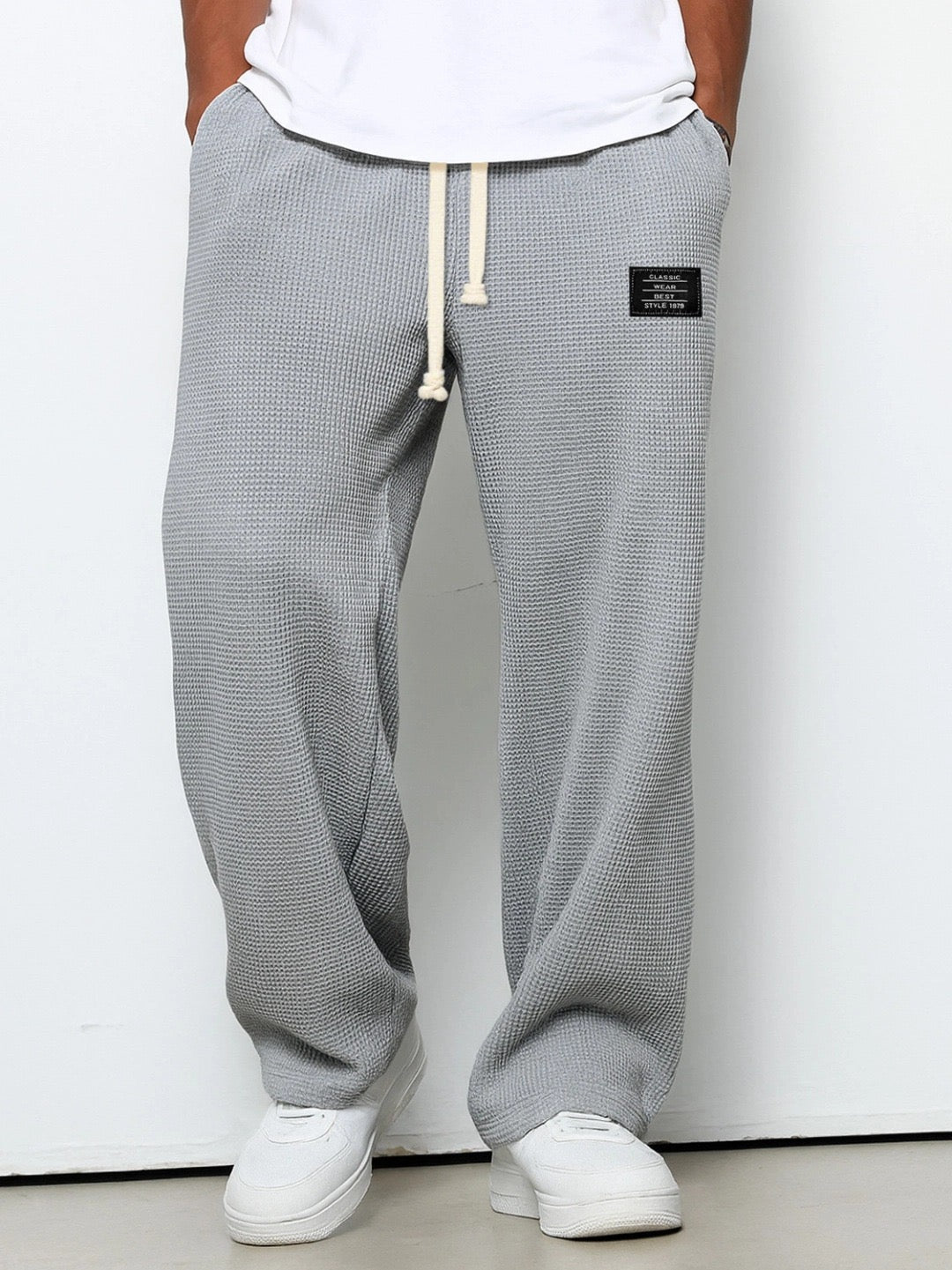 Pantalones de hombre de corte relajado con cintura ajustable