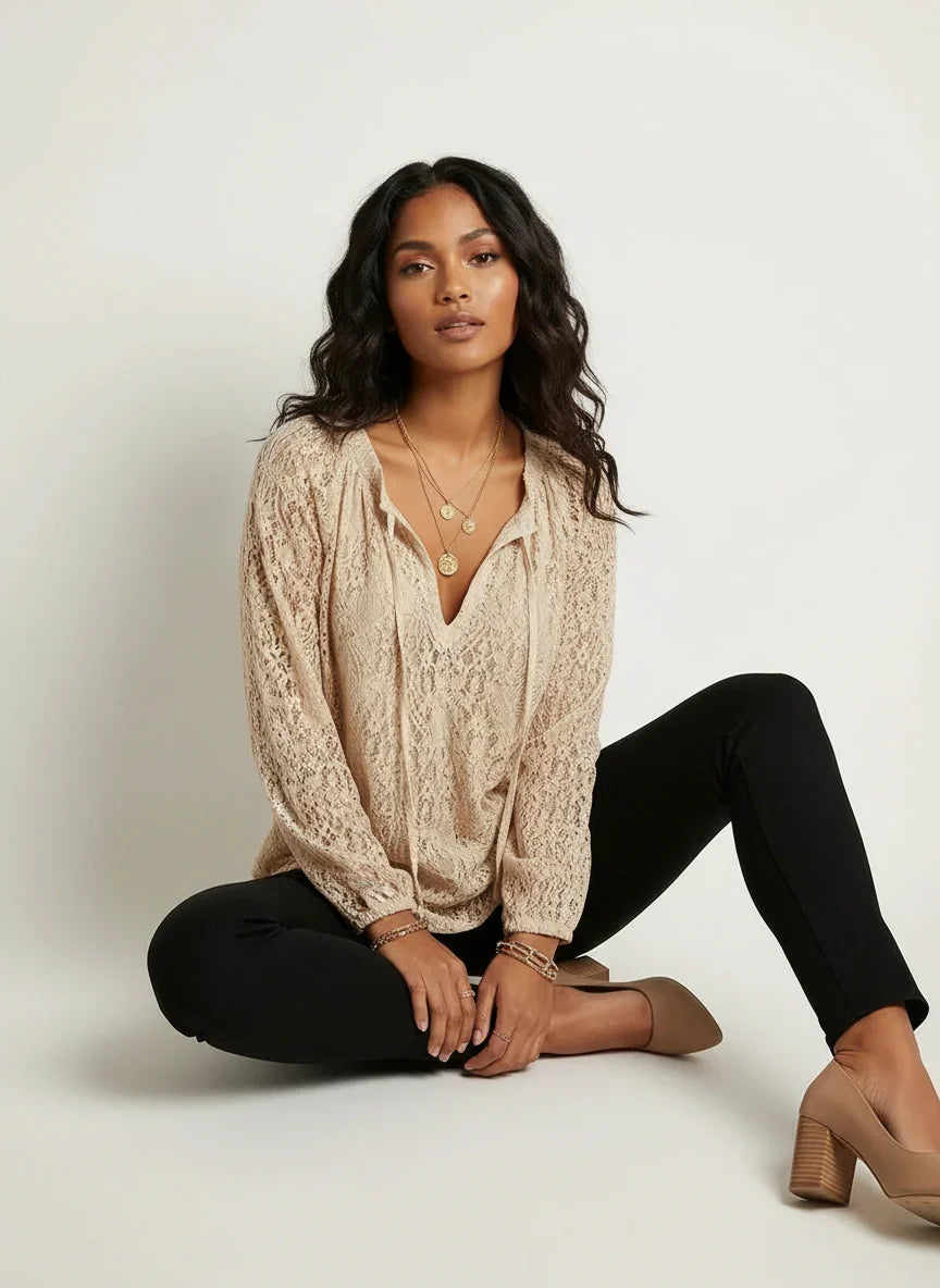 Blusa de mujer de encaje texturizado con lazo en el cuello