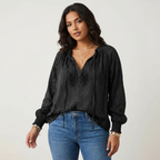 Blusa de mujer de encaje texturizado con lazo en el cuello