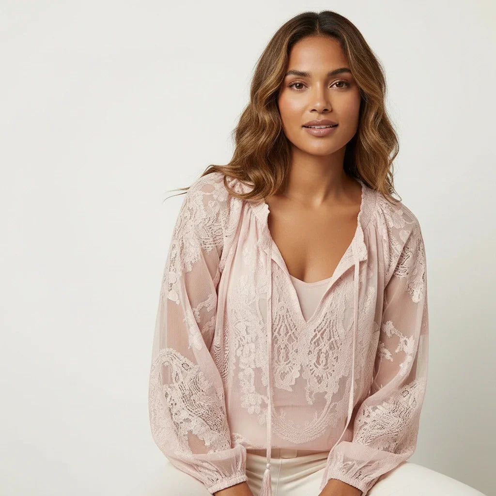 Blusa de mujer de encaje texturizado con lazo en el cuello