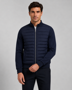 Chaqueta híbrida acolchada de hombre con mangas de punto