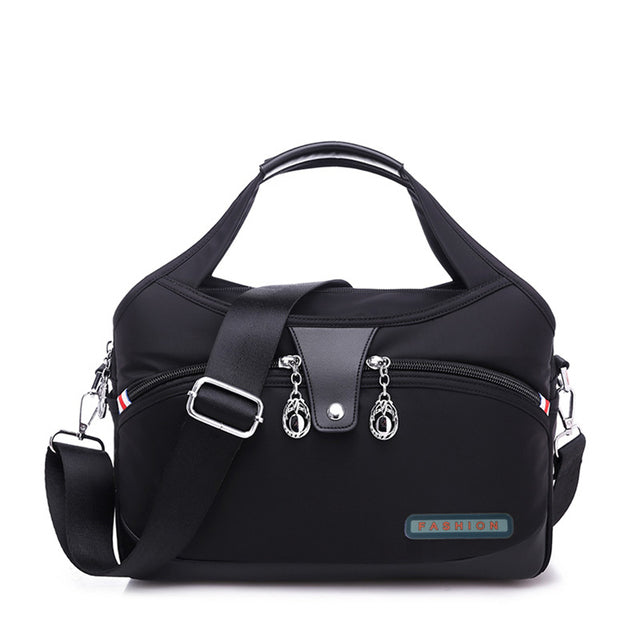 ANFINITE Anti-Tyveri Crossbody Taske med Stor Kapacitet