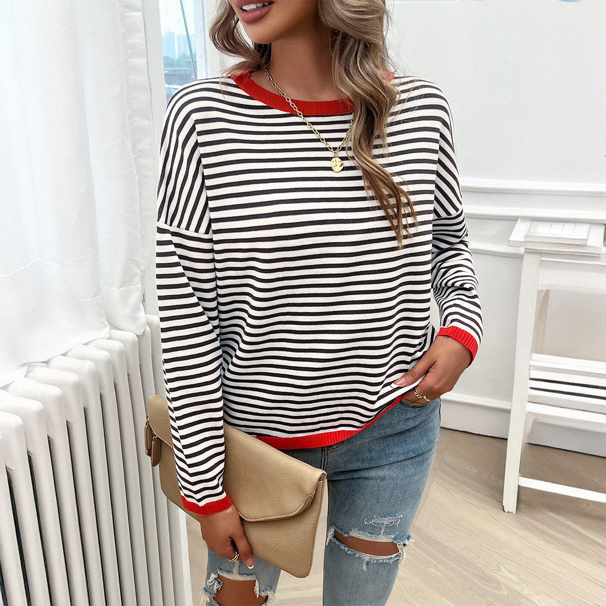 Pull léger pour femme en mélange de coton – col rond, coupe ample et épaules tombantes