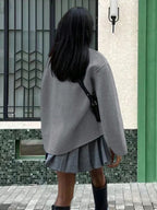 Abrigo de mujer oversize cruzado con cuello alto