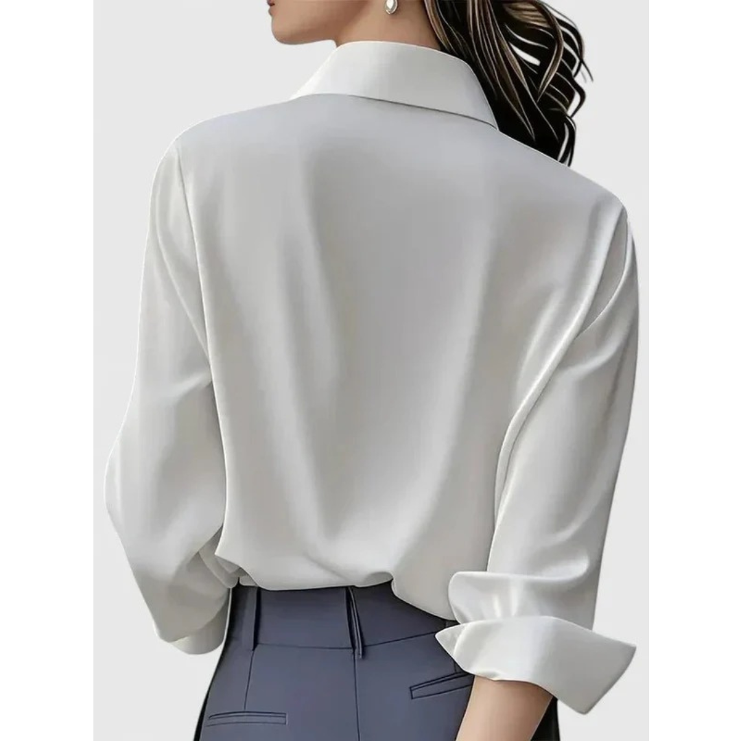 Blusa de mujer con efecto satinado, cuello y mangas largas