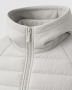 Chaqueta híbrida acolchada de hombre con capucha