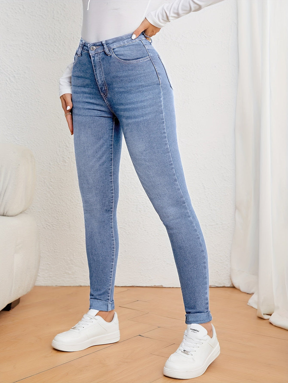 Jeans ajustados para mujer de tiro alto - denim elástico de corte slim