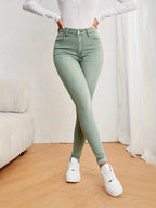 Jeans ajustados para mujer de tiro alto - denim elástico de corte slim